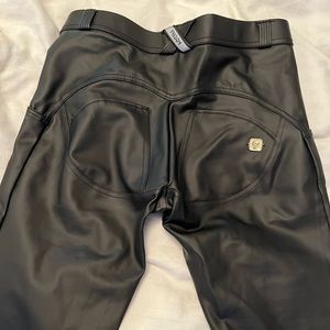 Freddy’s leather-like jeggings. Never worn.